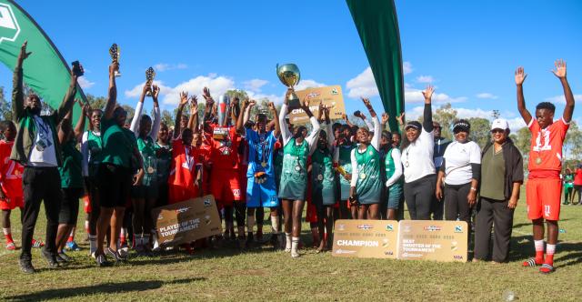 KEETMANSHOOP, 06 April 2026 - The Erongo Region's Under-20 football team and Kavango East netball team pictured after being crowned winners of the 2026 Nedbank Namibian Newspaper Cup at the Westdene Stadium in Keetmanshoop. Erongo won the match 2-1 against Kunene while Kavango defeated Khomas 35-28. (Photo by: Hesron Kapanga) NAMPA