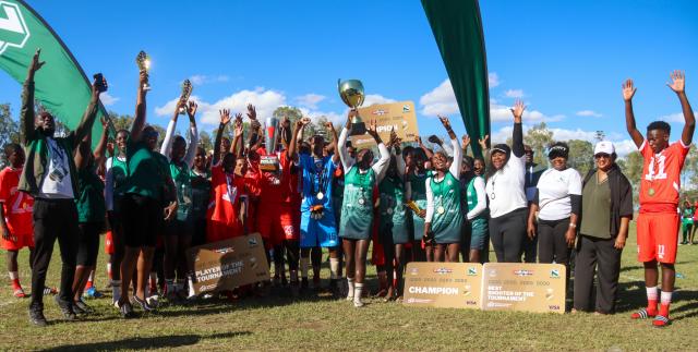 KEETMANSHOOP, 06 April 2026 - The Erongo Region's Under-20 football team and Kavango East netball team pictured after being crowned winners of the 2026 Nedbank Namibian Newspaper Cup at the Westdene Stadium in Keetmanshoop. Erongo won the match 2-1 against Kunene while Kavango defeated Khomas 35-28. (Photo by: Hesron Kapanga) NAMPA