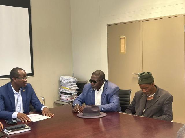 OPUWO, 14 April 2026- Kunene Governor Vipuakuje Muharukua, Chief Vemuii Tjambiru of the Otjikakurukouje Traditional Authority, together with Karungooyo Muhenje of the same authority, during a consultative meeting on traditional leadership disputes in Kunene Region. (Photo: Kaviveterue Virere) NAMPA 
