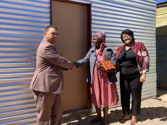 GIBEON, 17 April 2026- Hardap Governor Riaan McNab hands over three houses under the Cash for Work program
