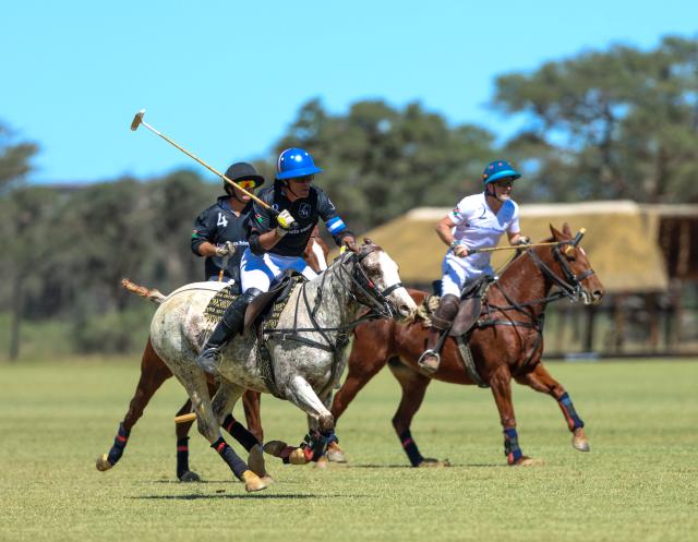 WINDHOEK, 18 April 2026 - Mariano Mazzitelli (in black) of La Muela Polo Club while in action against Jony Aboytie (in white) of Maranatha Polo Club during the country’s first-ever polo exhibition match at Farm Gocheganas, just outside Windhoek. La Muela Polo Club won the match 7-5. (Photo by: Hesron Kapanga) NAMPA