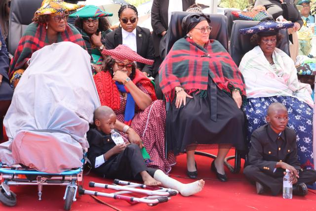 GAM, 19 April 2026 - Vice President, Lucia Witbooi (second from right) and close family members of the late James Uerikua pays their last respects at a community gravesite where the two were laid to rest on Sunday afternoon. (Photo by: Mulisa Simiyasa) NAMPA