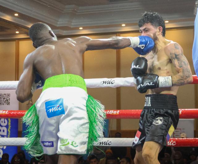 WINDHOEK, 09 May 2026 – Namibia’s World Boxing Organisation (WBO) Global Super Bantamweight champion, Fillipus Nghitumbwa (in green and white), while in action against Colombia’s Leonardo Carrillo in Windhoek. Nghitumbaw successfully retained his title after an impressive performance. (Photo by: Hesron Kapanga) NAMPA