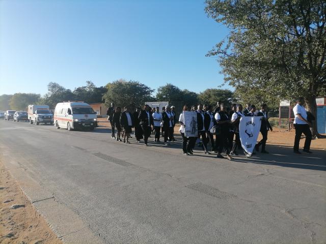 KHORIXAS, 13 May 2026 - Street procession Thursday morning to mark beginning of the mass memorial service of the 11 deceased people in the accident which occurred approximately 30 kilometres south of Otjiwarongo on 01 May 2026 at about 05h30. The bus they were traveling in belonged to the Ministry of Health and Social Services from the Khorixas State Hospital. (Photo by: Mulisa Simiyasa) NAMPA 