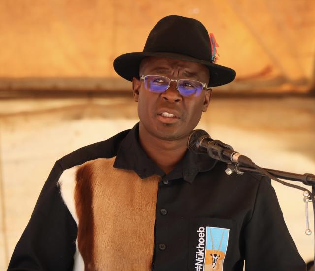 KHORIXAS, 13 May 2026 - Governor of the Kunene Region, Vipuakujue Muharukua speaks at the mass memorial service of the road accident which took place on 01 May 2026 south of Otjiwarongo in which a bus belonging to the Ministry of Health and Social Services was involved with a goods delivery truck. Family members at the memorial service on Wednesday at Khorixas sports field displayed the deceased framed photographs and cited names of three staff-members of the Ministry of Health and Social Services (Khorixas district hospital) as Metusalem Kamendu, 54, (driver), registered nurse Rebekka Kasheeta, 32, and enrolled nurse Martha Hangolonde, 28. Other victims were Ritha Jod, 18, Lazarus Hamutenya, 9, Nicoline Eises, 34, Elsario Nanuseb, 11, Geraldo Haraeb, 13, and Victoria Kanoutje, 45, who was allegedly travelling with Teyana Zaongara, 13, and Mervin Zaongara, 17. (Photo by: Mulisa Simiyasa) NAMPA