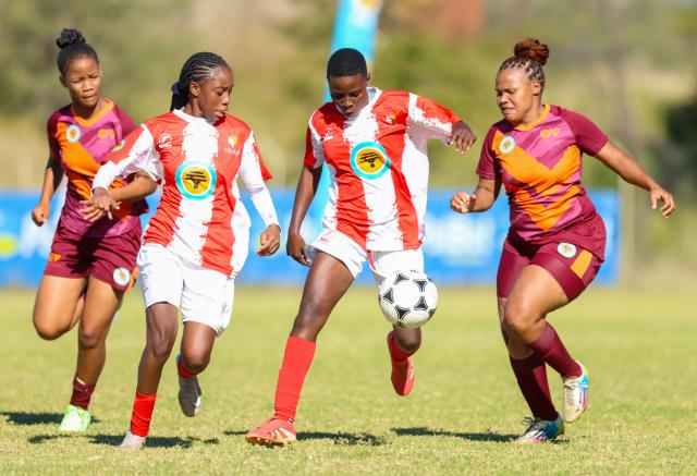 WINDHOEK, 16 May 2026 - A UNAM Bokkies player (in red and white) battles for possession against Ongos FC (in maroon) during Round 20 of the Women’s Super League at UNAM Stadium in Windhoek. The closely contested encounter ended in a goalless draw. (Photo by: Hesron Kapanga) NAMPA