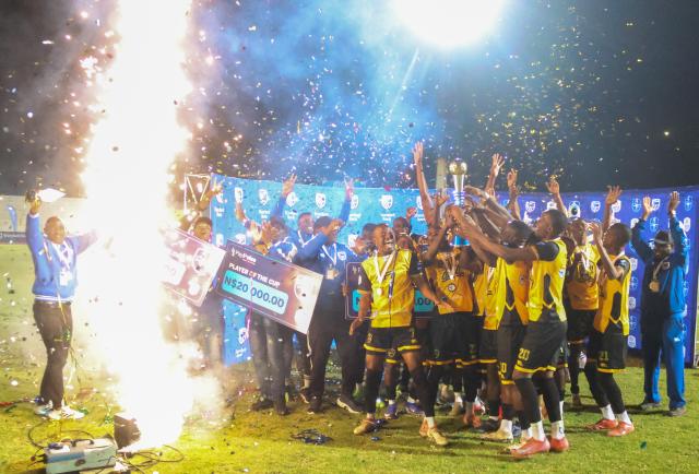 WINDHOEK, 23 May 2024 - Military outfit Mighty Gunners celebrating their firstever Standard Bank Top 8 title which they secured after a thrilling 2-1 victory over UNAM FC at the Independence Stadium. (Photo by: Hesron Kapanga) NAMPA