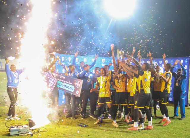 WINDHOEK, 23 May 2024 - Military outfit Mighty Gunners celebrating their firstever Standard Bank Top 8 title which they secured after a thrilling 2-1 victory over UNAM FC at the Independence Stadium. (Photo by: Hesron Kapanga) NAMPA