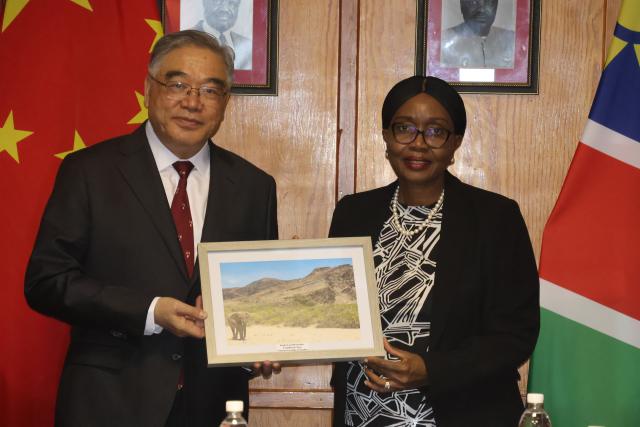 WINDHOEK, 27 May 2026 - Vice Chairperson of the National Committee of the China People’s Political Consultative Conference (CPPCC), Zhu Yongxin (L), and National Assembly Speaker, Saara Kuugongelwa-Amadhila (R) exchange gifts during a visit by a Chinese delegation to Parliament. (Photo by: Ali Negumbo) NAMPA