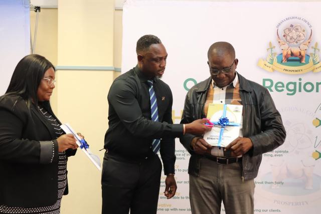 OSHAKATI, 10 June 2026- (From left to right)  Oshana Chief Regional Officer, Teopolina Hamutumua, Oshana regional governor, Hofni Iipinge and the Chairperson of the Oshana Regional Council Abraham Kaushiweni during the launch of the regional strategic plan and customer service charter on Wednesday. (Photo: contributed) 