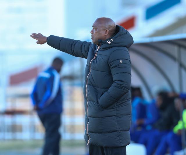 WINDHOEK, 20 June 2026 - UNAM FC head coach Robert Nauseb watches from the touchline during his side's Namibia Football Association (NFA) Cup semi-final match against Okahandja United at the Independence Stadium. UNAM FC won the match 1-0. (Photo by: Hesron Kapanga) NAMPA