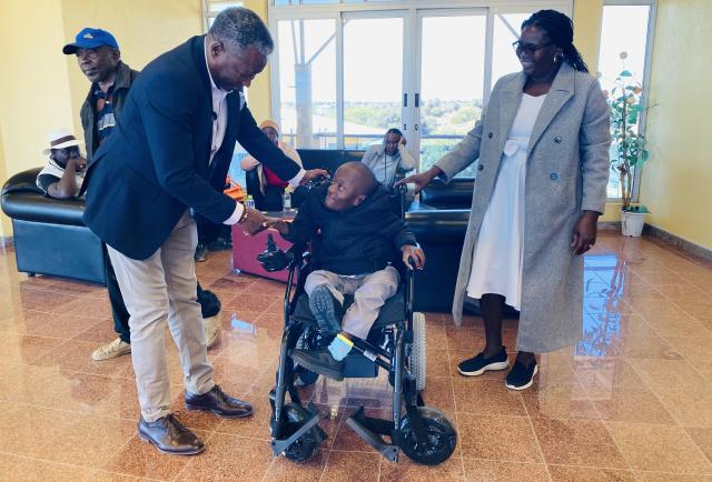 OMUTHIYA, 13 July 2026- Oshikoto Governor Sacky Kathindi (L), Justus Mbinga and his mother Katrina Mbinga after officially receiving an electronic wheelchair from the governor’s office on Monday.

(Photo: Max Henrich) NAMPA 