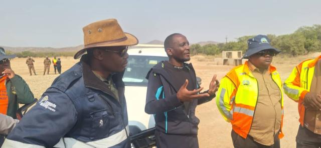 OPUWO, 22 July 2026- Kunene Region Governor Vipuakuje Muharukua, Minister of Works and Transport Veikko Nekundi and Roads Authority Chief Executive Officer Mbahupu Hippy Tjivikua during a briefing following the minister’s inspection of ongoing infrastructure projects in the region. (Photo: Kaviveterue Virere) NAMPA 