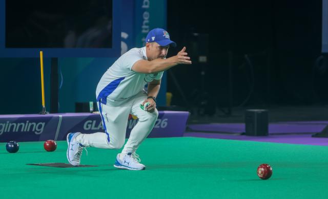 GLASGOW, 23 July 2026 - Waylon Wentzel of Team Namibia bowling during the mens single's match on the opening day of the Glasgow 2026 Commonwealth Games. (Photo by: Hesron Kapanga) NAMPA