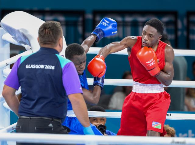 GLASGOW, 26 July 2026 - Philip Pumulo Mutakela Haoseb (in red) whicle in action against Charif Yaya of Togo during Round of 16 bouts at the Commonwealth Games in Glasgow, Scotland. Haoseb secured victory with a second-round knockout to advance to the quarter-finals. (Photo: Hesron Kapanga) NAMPA
