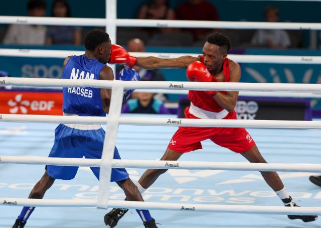 GLASGOW, 28 July 2026 – Namibia's 55kg boxer Philip !Haoseb (in blue) while in action against New Zealand's Alex Mukuka during the semifinals of the Commonwealth Games. !Haoseb won the fight on a split decision. (Photo: Hesron Kapanga) NAMPA
