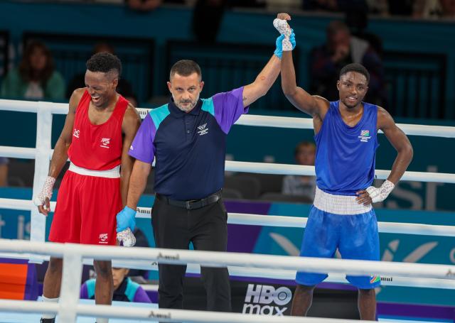 GLASGOW, 28 July 2026 – Namibia's 55kg boxer Philip !Haoseb (in blue) while in action against New Zealand's Alex Mukuka during the semifinals of the Commonwealth Games. !Haoseb won the fight on a split decision. (Photo: Hesron Kapanga) NAMPA
