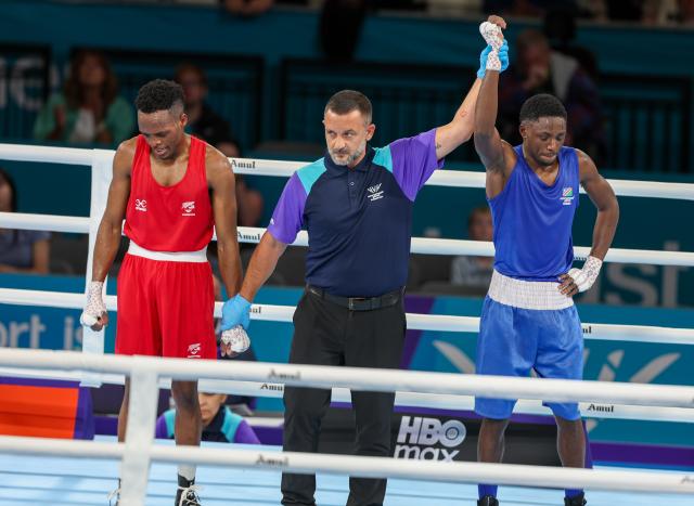 GLASGOW, 28 July 2026 – Namibia's 55kg boxer Philip !Haoseb (in blue) while after defeating New Zealand's Alex Mukuka during the semifinals of the Commonwealth Games. !Haoseb won the fight on a split decision. (Photo: Hesron Kapanga) NAMPA
