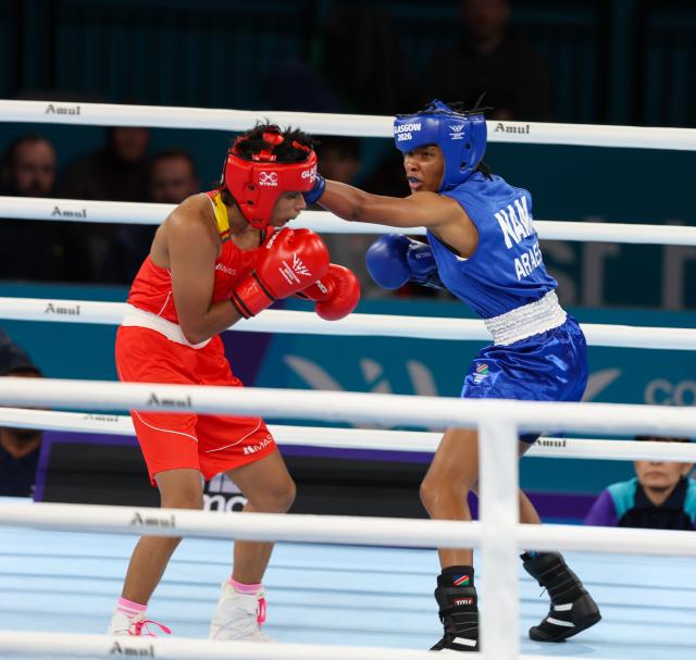 GLASGOW, 29 July 2026 – Namibia’s female boxer Mischa Monique Araes (in blue) in action against Sri Lankan Nadeeka Ranasinghe during the 51kg women division at the Commonwealth Games in Glasgow, Scotland. (Photo: Hesron Kapanga) NAMPA
