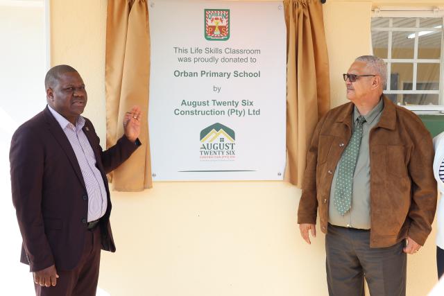 WINDHOEK, 07 August 2026 - Khomas Regional Director of Education, Arts and Culture, Paulus Nghikembua and Orban Primary School principal Jan Cloete at the handover of the new Life Skills class donated by August 26 Construction to the ORBAN Primary school. (Photo: Ali Negumbo)