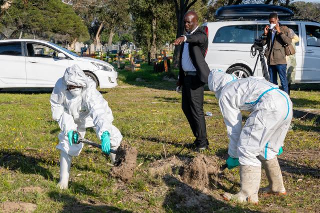 CAPE TOWN, 13 August 2026-Forensic workers clad in full personal protective equipment (PPE) dig up the grave site during the exhumation of the remains of Namibian liberation struggle hero Festus Nehale at a cemetery in Cape Town, South Africa, on Thursday, 13 August 2026. (Photo Contributed: MICT) NAMPA