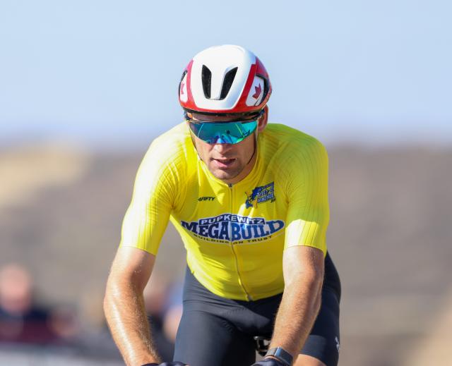 WINDHOEK, 21 August 2026 - Namibia’s international rider Alex Miller while crossing the line in during stage two of the 2026 Pupkewitz Megabuild Tour de Windhoek on the Dordabis Road. Miller won the stage with a huge margin from the peloton. (Photo: Hesron Kapanga) NAMPA