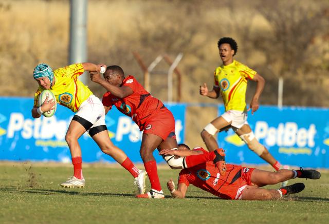 WINDHOEK, 15 August 2026 - UNAM Rugby Club players (in yellow) against Rehoboth during Round 11 of the Namibia Rugby Union Premier League at the Wanderers Sports Ground in Pioneerspark. Wanderers won the match 104-18. (Photo by: Hesron Kapanga) NAMPA