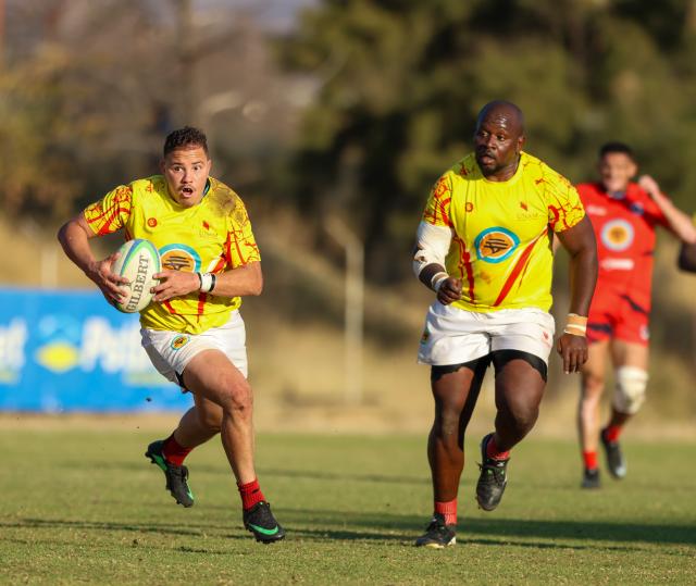 WINDHOEK, 15 August 2026 - UNAM Rugby Club players (in yellow) against Rehoboth during Round 11 of the Namibia Rugby Union Premier League at the Wanderers Sports Ground in Pioneerspark. Wanderers won the match 104-18. (Photo by: Hesron Kapanga) NAMPA