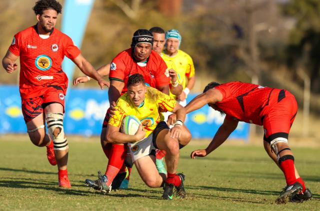 WINDHOEK, 15 August 2026 - UNAM Rugby Club players (in yellow) against Rehoboth during Round 11 of the Namibia Rugby Union Premier League at the Wanderers Sports Ground in Pioneerspark. Wanderers won the match 104-18. (Photo by: Hesron Kapanga) NAMPA