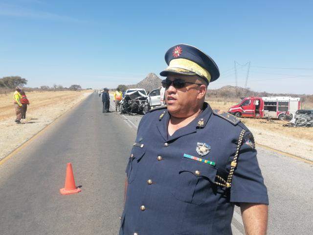 OTJIWARONGO, 21 August 2026 - The head of traffic department of the Namibian Police Force, Commissioner Petrus Swartz speaks at an accident scene Friday afternoon where two vehicles collided head-on approximately 10 kilometres south of Otjiwarongo on B1 road. Emergency personnel used jaws of life equipment to remove drivers from the wrecked vehicles. (Photo by: Mulisa Simiyasa) NAMPA