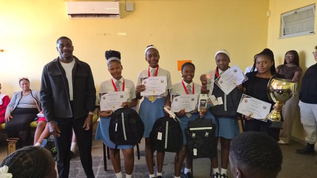 MARIENTAL, 18 September 2026-Learners and coach of Mariental High School pose with their prizes after winning the Secondary School Phase at the Hardap Regional Commerce Quiz in Mariental on Thursday. (Photo: Joe-Chintha Garises) NAMPA