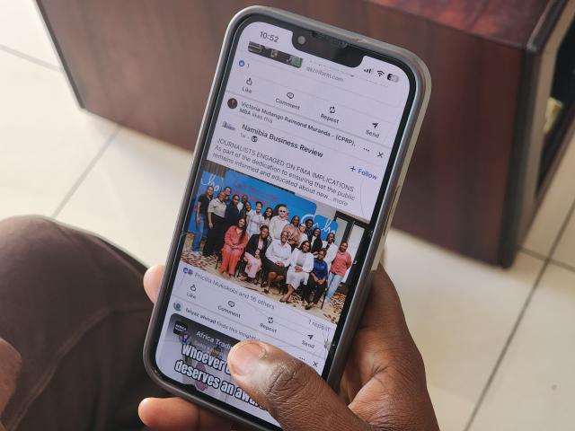 WINDHOEK, 18 September 2026 - A person using a cellphone. (Photo: Molly Weyulu) NAMPA