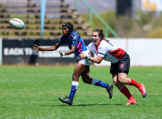 WINDHOEK, 19 September 2026 - Wanderers Women’s Rugby (in white) players while in action against Montego United (blue and white) during the Women’s 15s Rugby League at Hage Geingob Stadium in Olympia on Saturday. Wanderers won the match 24-19. (Photo: Hesron Kapanga) NAMPA
