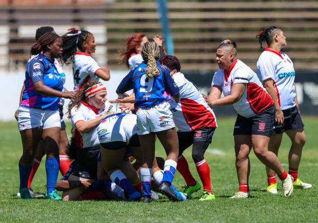 WINDHOEK, 19 September 2026 - Wanderers Women’s Rugby (in white) players while in action against Montego United (blue and white) during the Women’s 15s Rugby League at Hage Geingob Stadium in Olympia on Saturday. Wanderers won the match 24-19. (Photo: Hesron Kapanga) NAMPA
