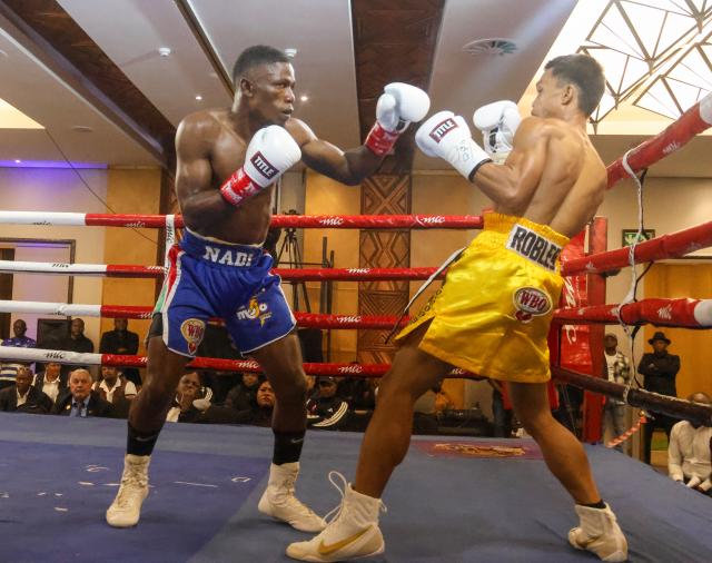WINDHOEK, 20 September 2026 – Namibia’s World Boxing Organisation (WBO) Global flyweight champion Fillemon Nghutenanye (left) while in action against Berland Robles of the Philippines at the Windhoek Country Club and Resort during the Salute Boxing Promotions’ Building of Champions: Battle for Greatness Boxing Bonanza. Nghutenanye securing a fifth-round technical knockout victory. (Photo: Hesron Kapanga) NAMPA