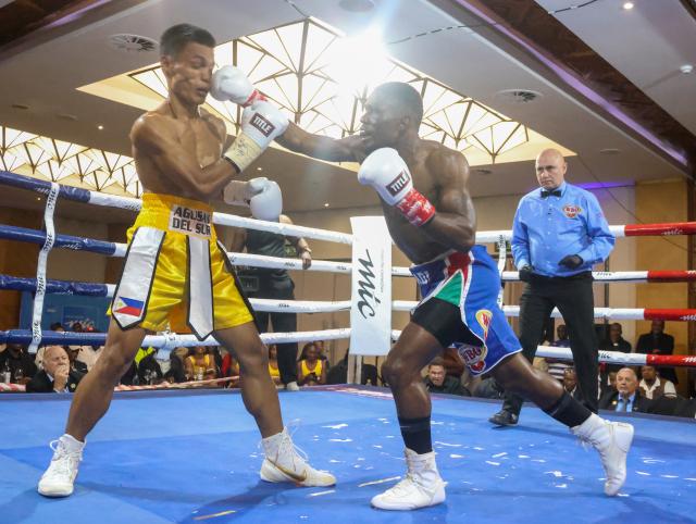 WINDHOEK, 20 September 2026 – Namibia’s World Boxing Organisation (WBO) Global flyweight champion Fillemon Nghutenanye (right) while in action against Berland Robles of the Philippines at the Windhoek Country Club and Resort during the Salute Boxing Promotions’ Building of Champions: Battle for Greatness Boxing Bonanza. Nghutenanye securing a fifth-round technical knockout victory. (Photo: Hesron Kapanga) NAMPA
