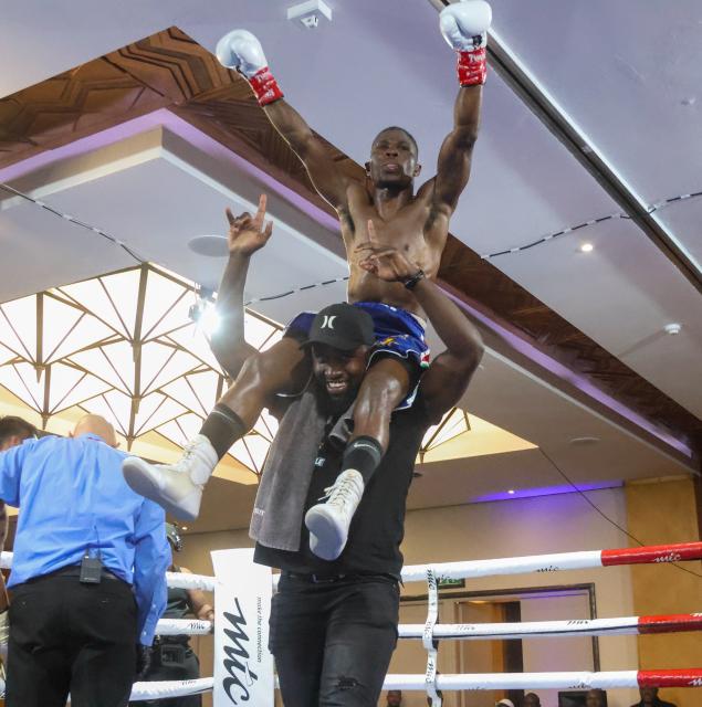 WINDHOEK, 20 September 2026 – Namibia’s World Boxing Organisation (WBO) Global flyweight champion Fillemon Nghutenanye while celebrating with his training after defeating Berland Robles of the Philippines at the Windhoek Country Club and Resort during the Salute Boxing Promotions’ Building of Champions: Battle for Greatness Boxing Bonanza. Nghutenanye securing a fifth-round technical knockout victory. (Photo: Hesron Kapanga) NAMPA
