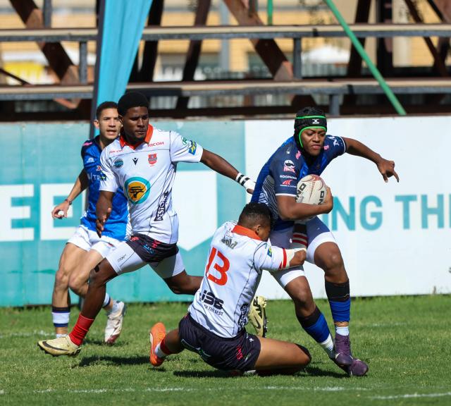 WINDHOEK, 20 September 2026 - Wanderers Rugby Club (in white) and Montego United during the last Namibia Rugby Union Premier League Fixture at Hage Geingob Stadium on Saturday. Wanderers defeated their arch-rivals 41-29. (Photo by: Hesron Kapanga) NAMPA