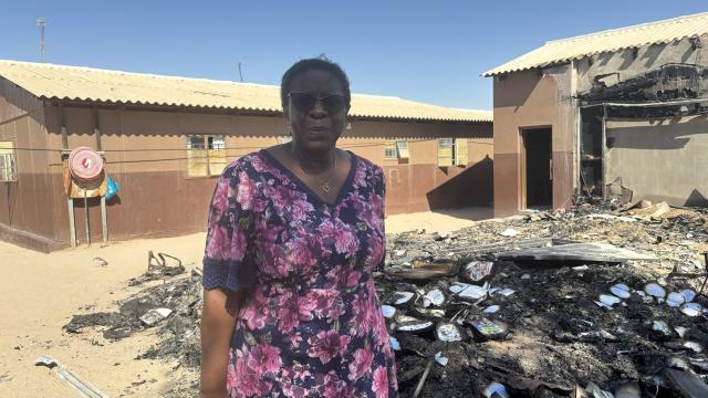 UTUSEB, 24 May 2024 - The matron’s accommodation and storeroom at the JP Brand Primary school  had burnt down in 2024. The School Principal Anna Josti stands by the fire ruins and had called on stakeholders to come onboard and repair the damages. MTC Namibia donated to the course by constructing a block of two classrooms, storerooms and renovations to existing structures through the MTC Rural Schools Project. (Photo by: Isabel Bento) NAMPA