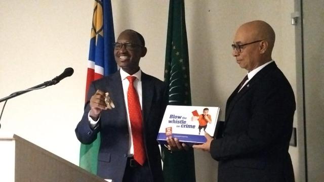 WINDHOEK, 01 October 2026 – Former ACC director-general Paulus Noa passing the baton to his successor Bryan Eiseb (Photo: Andreas Thomas) NAMPA