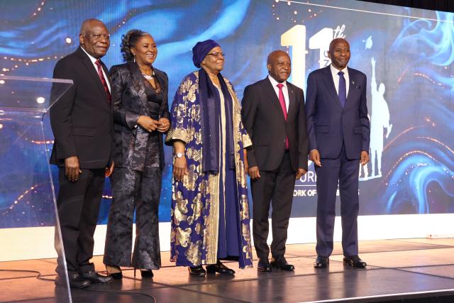 WINDHOEK, 02 October 2026 - From left to right: First Gentleman of Namibia, Lieutenant General Epaphras Denga Ndaitwah, One Economy Executive Chairperson Monica Geingos, President Netumbo Nandi-Ndaitwah, Prime Minister Elijah Ngurare and former speaker  of the National Assembly Peter Katjavivi pose for a photo at the One Economy Foundation Fundraising Soiree. (Photo: Molly Weyulu) NAMPA 