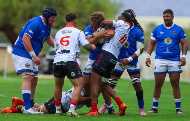 WINDHOEK, 10 October 2026 - Wanderers players in white and Kudus player while in action during the final of the 2026 Namibia Rugby Union Premier League final at the Hage Geingob Stadium in Olympia. (Photo by: Hesron Kapanga) NAMPA
