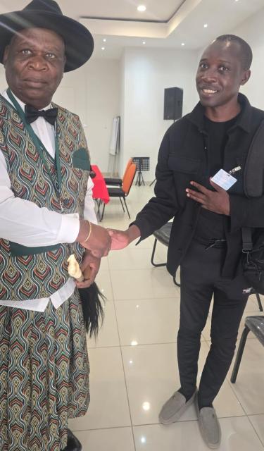 OTJIWARONGO, 19 October 2026 - Chief George Simasiku Mamili (left) of the Mafwe Royal Traditional Authority in the Zambezi Region poses for a photo with Mulisa Simiyasa at the 27th annual meeting of Council of Traditional Leaders in Namibia at Otjiwarongo on Monday morning. (Photo by: Confidence Musariri) NAMPA 