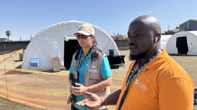 SWAKOPMUND, 28 October 2026 - Comprehensive Nuclear-Test-Ban Treaty Organisation (CTBTO) Namibian Surrogate Inspectors Samuel Nengola and Feruschka Himarua explaining what happens at the base of Operations, where each participating country’s surrogate inspector is stationed during the exercise. (Photo by: Isabel Bento) NAMPA