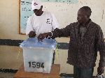 SIBBINDA, 14 SEPTEMBER 2012 - Voting began at a snail's pace in the Sibbinda Constituency by-election currently underway in the Caprivi Region. Seen here are eligible voters at the Sikosinyana Secondary School polling station queuing to cast their votes. (Photo by: Olavi Haikera) NAMPA 