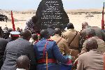 SWAKOPMUND, 29 March 2014 - The lives of OvaHerero/OvaMbanderu and Nama people who perished during the 1904-1908 genocide were commemorated at Swakopmund in the Erongo Region on Saturday. Here OvaHerero Paramount Chief Kuaima Riruako and a number of OvaHerero/OvaMbanderu and Nama community members at a memorial stone erected in honour of the deceased at the old Swakopmund cemetery. (Photo by: Joseph Nekaya) NAMPA 
