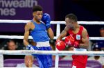 BIRMINGHAM, 01 August 2022 – Namibia’s featherweight (54-57 kilogram) boxer, Tryagain Morning Ndevelo (in blue), in action against Jone Davule of Fiji at the NEC Centre during the 2022 Birmingham Commonwealth Games. (Photo by: Hesron Kapanga) NAMPA