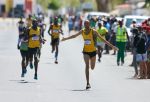 OMARURU, 21 October 2023 - Namibian Correctional Services athlete David Dam (right) and Rainhold Tomas (left) while in action during the Erongo Power Save Omaruru Street Mile in Omaruru. (Photo by: Hesron Kapanga) NAMPA