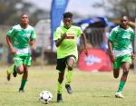 GOBABIS, 29 March 2024 - Richard Pablo of the Kavango West Region (in light green) while in action against Kavango East during the 22nd edition of the Namibian Newspaper Cup at the Legare Stadium in Gobabis. (Photo by: Hesron Kapanga) NAMPA