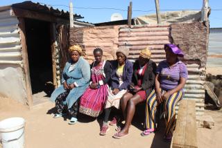 MARIENTAL, 29 August 2024 - The grandmother and family members of Einoritha Mhopyeni, whose body was found at Dates Farm outside Mariental on Monday. (Photo by: Charmaine Boois) NAMPA